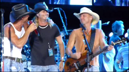 Tim McGraw, Bret Michaels, Kenny Chesney on stage at a Kenny Chesney Show